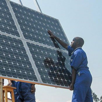 Solar panel being installed by a man